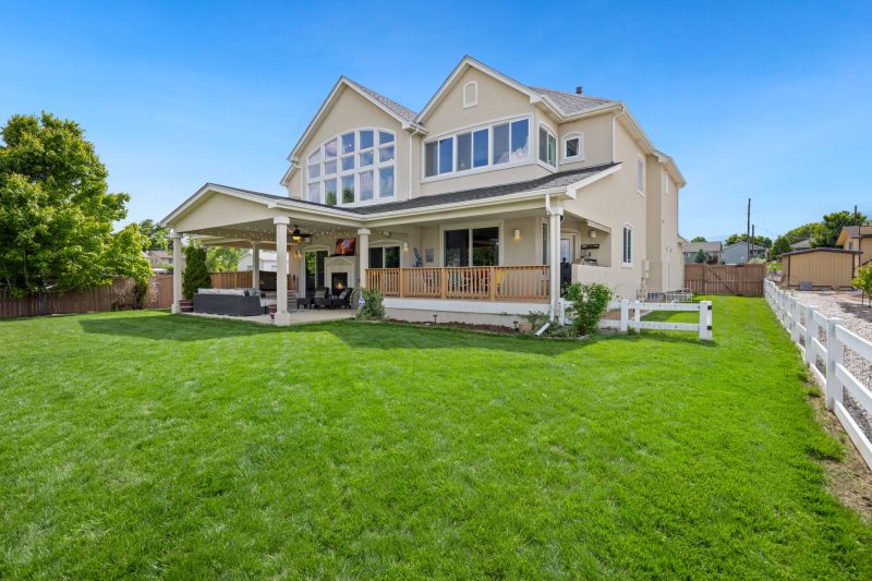 Home 14 Beautiful twostory suburban house with a large green lawn an 1783443846
