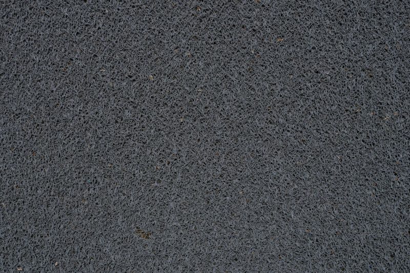 Home 14 Detailed view of a gray synthetic doormat showcasing its fib 1786467764